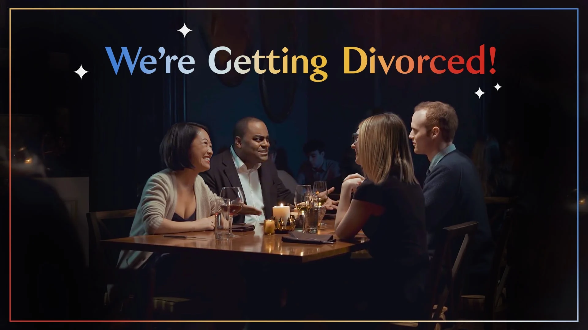 Two couples at a candlelit dinner